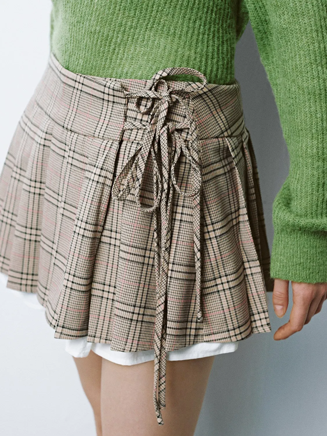 Pleated Lace Up Front Mini Skirts